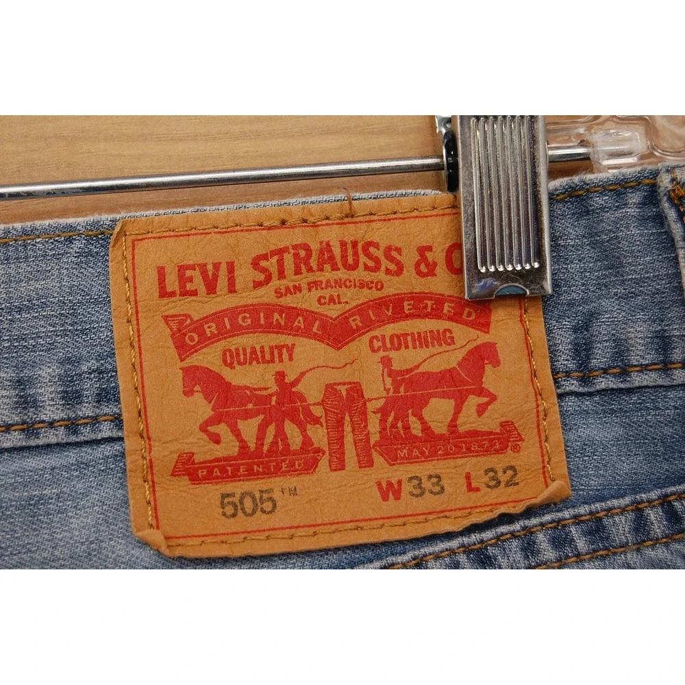 Levis 505 Jeans Mens 33x32 Light Blue Straight Leg Distressed Zip Fly 00505-0235